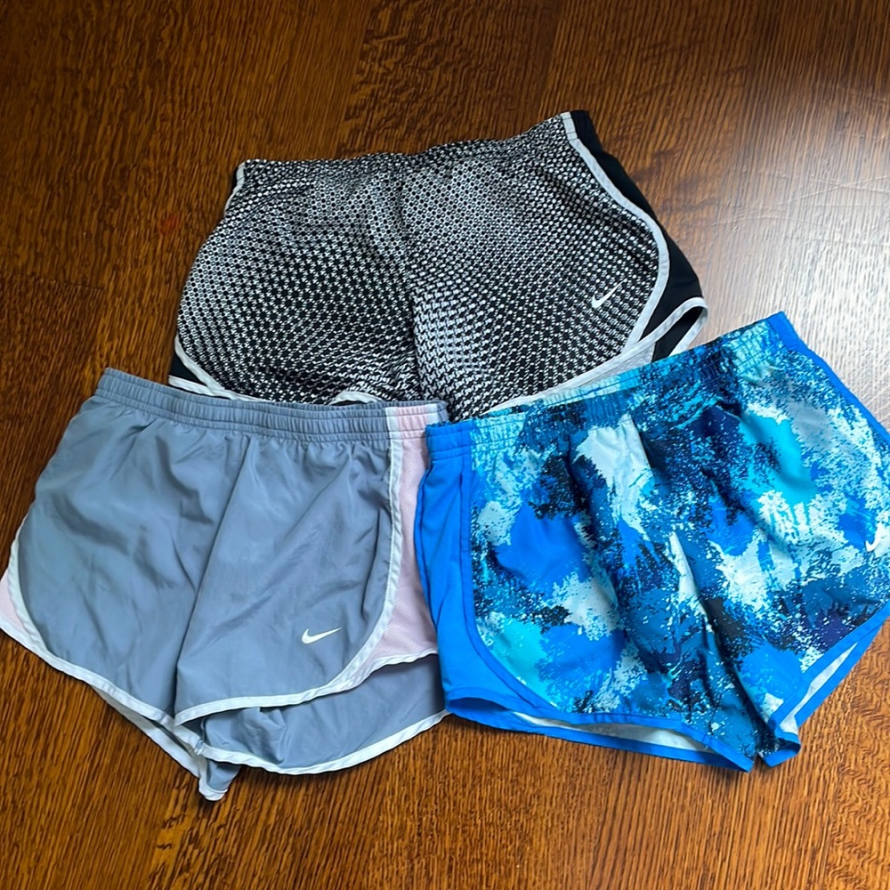 Three nike shorts for girls in the size medium